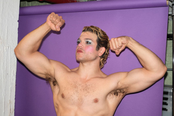 Image may contain Adult Person Baby Body Part Shoulder Hair Face and Head
